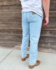 A WARDROBE CLASSIC FOR EVERY COWBOY For more than 70 years, our 13MWZ Cowboy Cut® jeans have been a tried-and-true wardrobe staple for cowboys across the country. Today, 13MWZ is the official ProRodeo competition jean. We knew a good thing when we saw it, which is why the Wrangler® Cowboy Cut® jeans haven't changed much since they were first designed by 'Rodeo Ben' Lichenstein in 1947. These comfortable, durable jeans come fully equipped with all the authentic details you'd expect from a hallmar Modern Cowboy Style Men, Wrangler Cowboy Cut Jeans, Cowboy Cut Jeans, Husband Clothes, Wrangler Cowboy, Modern Cowboy, Jeans Outfit Men, Wrangler Cowboy Cut