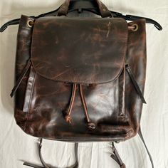 Genuine Leather, Never Used Leather Satchel. Smoke-Free Home. Sizes Shown In Photos Brown Leather Backpack With Detachable Strap For Daily Use, Casual Bags With Leather Lining For On-the-go, Casual Shoulder Bag With Leather Backing For Errands, Brown Leather Backpack With Detachable Strap For On-the-go, Vintage Leather Backpack For On-the-go, Versatile Leather Satchel Backpack, Casual Leather Satchel For Errands, Brown Leather Backpack With Removable Pouch, Brown Leather Backpack With Removable Pouch And Double Handle