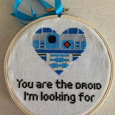 a cross stitch heart with the words you are the proud i'm looking for