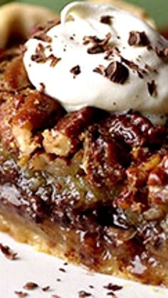 a slice of pecan pie with ice cream on top