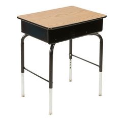 a black desk with a wooden top and metal legs