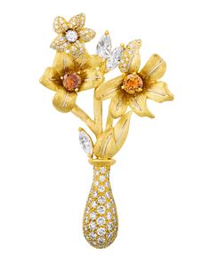 This sophisticated brooch from the famed American jeweler Henry Dunay takes the form of a bouquet of beautiful amaryllis flowers. Two colored diamonds totaling approximately 1.00 carat form the center of the two largest flowers, while 4.50 carats of white diamonds encrust the vases and other floral forms. Set in 18K yellow gold and platinum. Known for his one-of-a-kind jewelry, Henry Dunay is one of the most celebrated contemporary jewelers in the world. Boldly sophisticated, this brooch is exem Amaryllis Flowers, Floral Brooch, Large Flowers, White Diamonds, Lapel Pins, Diamond White, Colored Diamonds, Brooches, Platinum