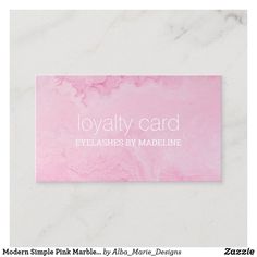 a pink marble business card with the words, royaltyly card