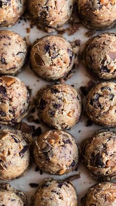 chocolate chip muffins on a baking sheet ready to be eaten