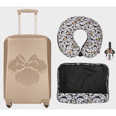 Embark on a Disney adventure with the luggage set featuring a gold suitcase with an image of Minnie’s mouse ears and bow, a matching ID-Tag with Minnie’s face, and a neck pillow and packing cube with all-over print of Minnie Mouse. The rolling suitcase removes the need for heavy lifting while the zippered packing cube can store smaller items. The neck pillow’s plush memory fabric will keep you comfy and relaxed on your travels. Casual Minnie Mouse Backpack For Disney Trips, Minnie Mouse Suitcase, Cute Mickey Mouse Bags For Disney Trips, Minnie Mouse Travel Backpack, Disney Minnie Mouse Backpack For Travel, Disney Suitcase, Cute Minnie Mouse Travel Bag, Disney Luggage, Hardside Luggage Sets