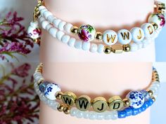 WWJD bracelet, Christian mom gift, Bible verse bracelet, Christian Graduation gift, Scripture Bracelet, Christian gift, faith jewelry this beautiful blue bracelet is made with glass seed beads 4mm and 6 mm ceramic blue and white beads. The pink is made with 6 mm ceramic floral beads. The letters are gold coloured 6mm in size or white. both have 2 charms on the ends, according to the color. made with memory wire. it will fit mostly every wrist. because is made with memory wire, it won't break. You can choose the color: blue or pink. You also can choose the letters colors: gold or white. the letters are: WWJD, which means: What Would Jesus Do this is a perfect gift for mom, sister, daughter, friend or for yourself! thank you! God bless you.  also available in my shop Salvation Bracelet and c Inspirational Blue Bracelets For Gifts, Personalized Inspirational Blue Bracelets, Blue Name Bracelet For Mother's Day Gift, Mother's Day Blue Name Bracelet Gift, Blue Bracelets For Mother's Day Personalized Gift, Christian Graduation Gifts, Scripture Bracelet, Salvation Bracelet, Christian Mom Gifts