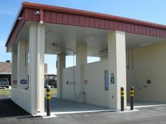 an empty gas station with no one at the pump