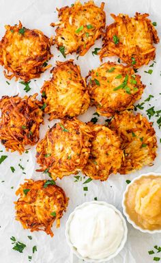 potato cakes with sour cream and parsley on the side, ready to be eaten