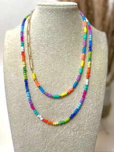 22" colorful necklace Each necklace sold separately Disclaimer: colors could vary slightly from photos Colorful Beaded Adjustable Necklaces, Trendy Multicolor Single Strand Necklaces, Trendy Multicolor Single Strand Necklace, Trendy Multicolor Single Strand Jewelry, Colorful Adjustable Necklaces With Round Beads, Adjustable Rainbow Necklace With Colorful Beads, Adjustable Multicolor Charm Necklaces With Colorful Beads, Colorful Adjustable Beaded Chain Necklace, Colorful Long Necklace For Jewelry Making