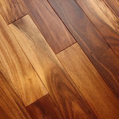 a close up view of a wooden floor with some wood grains on the surface