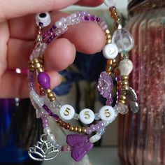 Handmade By Me 555 Angel Number Bracelet Set. The Numbers 555 Call In Change, Transformation, And Freedom . I've Made This Set With Butterflies, A Silver Lotus, Raw Amethyst And Quartz, Howlite Skulls, Glass Floral Beads, And Purples, Golds, And Pearls. Wear This Set To Remember That You Are Free And Transforming Into Who You Want To Be . Made With Strong Stretchy Elastic To Fit Most. Approximately 7 Inches Around. If You Like This I Can Make Custom Necklaces, Bracelets, Anklets, Rings, And Earr Custom Necklaces, Raw Amethyst, Angel Number, The Numbers, Custom Necklace, Purple Gold, Womens Jewelry Bracelets, Bracelet Set, Anklets