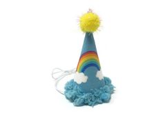 Cutest mini hat with a rainbow for the smallest members of your family - guaranteed to be the highlight of the party! Fit: The base is a little larger than the size of a quarter and comes with a delicate elastic chin strap that is adjustable. All of my hats have a sturdy card stock interior and are built to last! This hat will fit most small animals, such as chickens, hedgehogs, rabbits, ferrets, iguanas, etc. If you are unsure of the size, test-fit your pet with a quarter on the top of his head Fun Hats For Birthday And Carnival, Fun Carnival Birthday Hats, Fun Birthday Carnival Hats, Multicolor Playful Costume Hats And Headpieces For Party, Multicolor Playful Costume Hats For Party, Playful Multicolor Costume Hats And Headpieces For Party, Playful Blue Hat For First Birthday, Fun Mini Hats For Birthday Carnival, Novelty Multicolor Mini Hats For Party