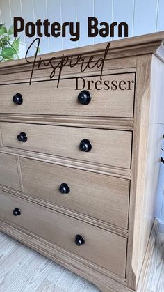 a wooden dresser with the words pottery barn painted on it's front and bottom