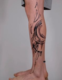 a person with a tattoo on their leg