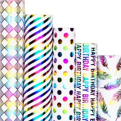 colorful birthday wrappings are lined up on a white background with the words happy birthday written across them