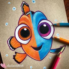 a drawing of an orange and blue fish with big eyes on it's face