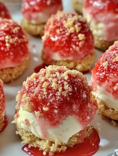 strawberry shortcakes with cream cheese and crumbs on top are ready to be eaten