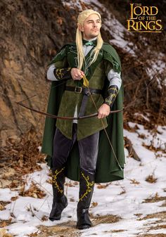 a man dressed as lord of the rings holding a bow and arrow in his hand