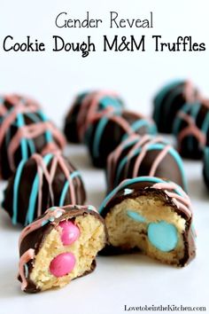 a close up of some kind of candy on a white surface with the words cookie dough m & m truffles