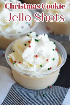 christmas cookie jello shots with sprinkles and white frosting in small plastic cups