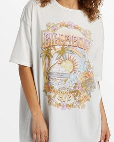 Soak up the day's magic moments in Billabong's Golden Hour T-shirt. Oversized and effortlessly cool, this baggy women's tee is crafted of a loose-knit cotton jersey with screen-printed graphics. Fabric: Loose knit cotton jersey fabric Dye/Wash: Piece dye with garment wash Fit: Oversize fit Neck: Crew neck Sleeves: Short sleeves Branding: Graphic screen print in soft-hand ink Womens Oversized Tee, Free People Swim, Fabric Dye, Swimwear Store, Magic Moments, Salt Crystal, Cotton Jersey Fabric, Billabong Women, Loose Knit