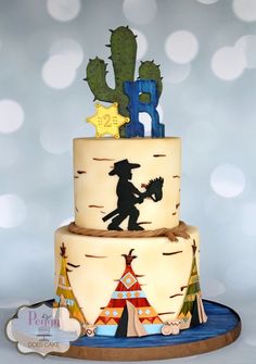 a three tiered cake decorated with an image of a person on the top layer