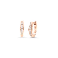 Featuring pave diamonds along the front of the hoops, these huggie earrings are perfect for wearing alone or layering with other pieces. Don't worry, they still make a sparkly statement. Diamond Accented Huggie Earrings, Huggie Earrings With Diamond Accents, Diamond Huggie Earrings With Pave Setting, Everyday Luxury Huggie Earrings With Pave Setting, Rose Gold Huggie Hoop Earrings Vvs Clarity, Everyday Luxury Huggie Diamond Earrings, Diamond White Huggie Earrings With Pave Setting, Fine Jewelry Huggie Earrings With Pave Setting, Diamond White Pave Huggie Earrings