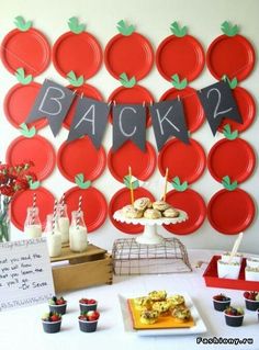 an apple themed birthday party with cupcakes, muffins and desserts