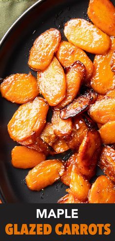 maple glazed carrots on a black plate with text overlay that reads maple glazed carrots