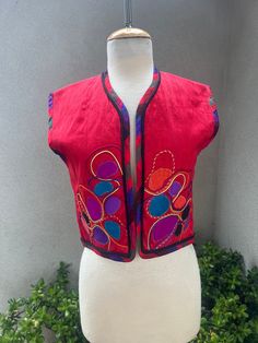 Vintage boho Thai silk vest bolero style red black with patches abstract art Small. possible custom made, no labels. Very good condition. Measurement  Shoulder 15" Bust waist 36" Length 18" Fitted Multicolor Patchwork Vest, Multicolor Patchwork Fitted Vest, Fitted Patchwork Vest For Festival, Fitted Red Vest For Spring, Red Fitted Vest For Spring, Red Vest For Fall Festival, Vintage Red Vest For Summer, Red Vintage Vest For Summer, Red Vintage Summer Vest