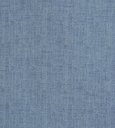 a blue fabric textured with small dots