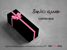 a black box with a pink bow on it and the words, the squid game coffin box