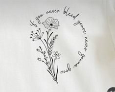 a white t - shirt with black lettering and flowers on the front, says you never heard your mother