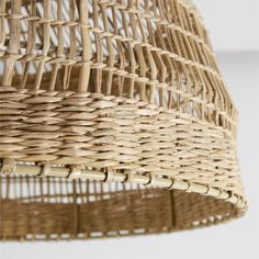 a wicker basket hanging from the ceiling