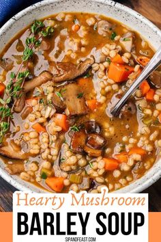 hearty mushroom barley soup in a bowl with carrots and parsley on the side