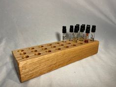 "This fragrance sample display is the perfect way to showcase and organize your perfume and cologne samples! Handcrafted from red oak, this holder has slots for 27 1ml official perfume samples  in 7/16\" slots, you would get from department stores or the perfumeries." Sample Display, Perfume And Cologne, Department Stores, Red Oak, Doterra, Slots