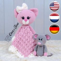 there is a pink teddy bear and a gray mouse