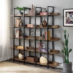 PRICES MAY VARY. Retro Industrial Style- KIVENJAJA 5 shelf bookcase features a minimalist design. Black finish metal frame and brown wood-grain panels make the shelf a vintage look, which blends in with any themed room and makes an impression. Triple Wide 5-Tire Large Shelves- Size: 70.87 "W x 11.81 "D x 70.87 "H. Space between shelves: 13.98". This industrial bookshelf maximizes vertical storage space for displaying your favorite reads, collections, photos and keeping your home organized. Stabl Open Bookshelf, Display Bookcase, Industrial Bookshelf, Open Bookshelves, 5 Shelf Bookcase, Vintage Industrial Style, Regal Design, Open Bookcase, Etagere Bookcase