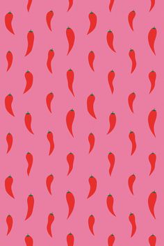 a pink background with red peppers on it