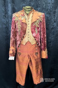 an orange and pink suit with gold trimmings on the collar, pants and chest