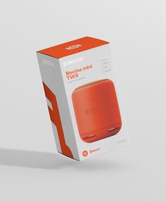 an orange box with the packaging on it's side is shown in front of a white background