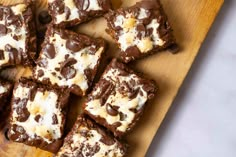 chocolate and marshmallow squares on a cutting board