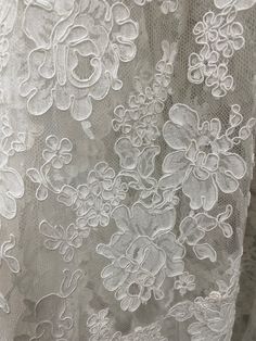 Reem Acra Camilla 5571: Re-Embroidered Lace overskirt by Reem Acra Color: White Lace Allow 1 week to ship or pick up at our Morristown, NJ location. White Floral Embroidered Skirt For Wedding, White Floral Embroidery Skirt For Wedding, White Floral Embroidered Wedding Skirt, White Embroidered Wedding Skirt, White Floral Embroidered Full Skirt Dress, Lace Full Skirt Dress With Lined Skirt, Lace Full Skirt For Wedding, White Lace Patchwork Skirt For Wedding, White Wedding Skirt With Lace Patchwork