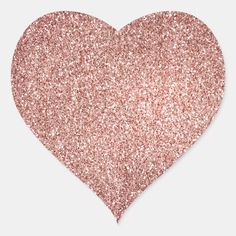 a heart shaped pink glitter sticker