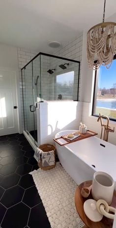 a white bath tub sitting next to a window