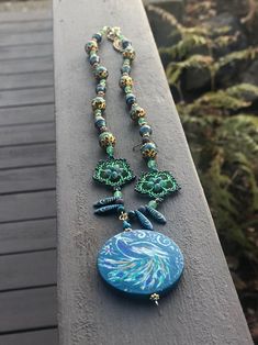 Proud as a Peacock 2 | Etsy Hand Painted Blue Spiritual Necklace, Traditional Hand Painted Adjustable Necklace, Green Wooden Beads Jewelry For Festival, Traditional Adjustable Hand Painted Necklace, Turquoise Beaded Necklace With Nature-inspired Style, Bohemian Peacock Necklace As Gift, Turquoise Beaded Nature-inspired Necklace, Bohemian Peacock Necklace For Gift, Green Wooden Beads Necklaces For Festivals