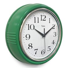 a green wall clock with white numbers on the face and hands, against a white background