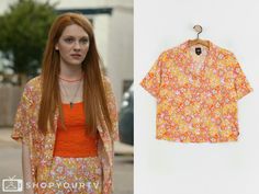 a woman with long red hair wearing an orange top next to a photo of her shirt