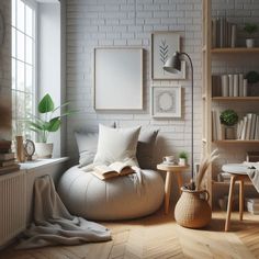 a living room with white brick walls and wooden flooring is furnished with bookshelves