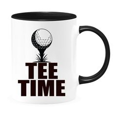 a black and white coffee mug with a golf ball on it that says tee time